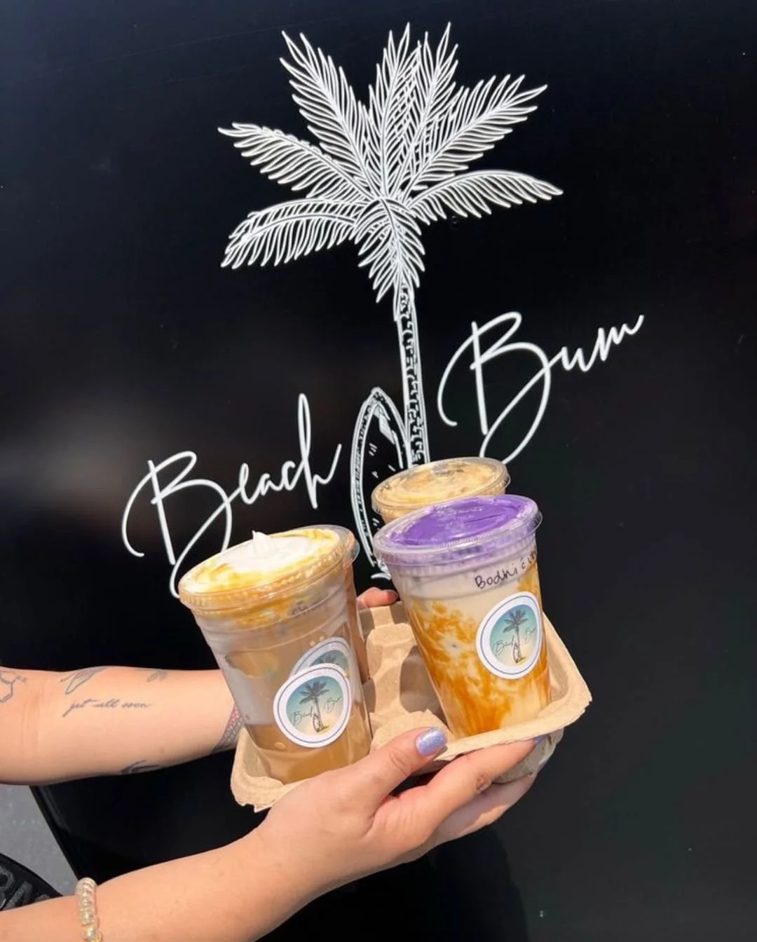 Beach Bum Coffee drinks being handed through the service window
